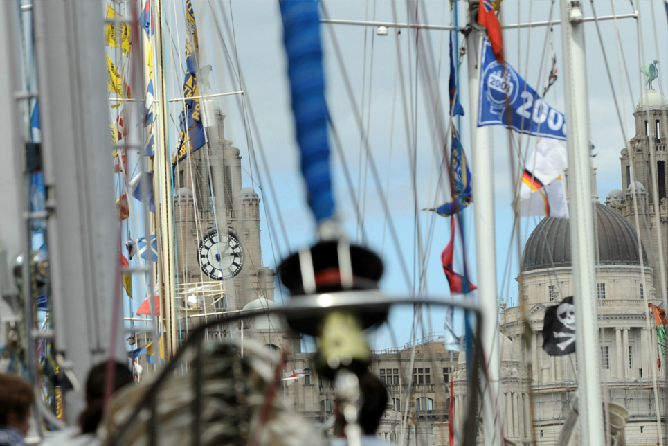 The clock tower of the Liver Building, through the rigging