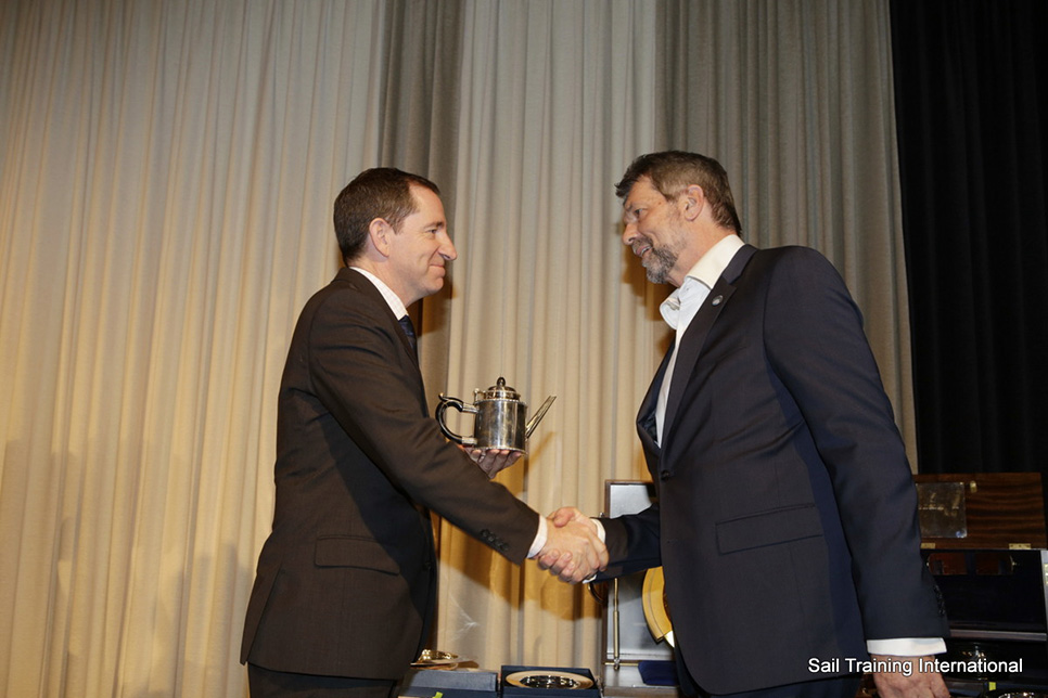 Captain Jarle Flatebo (Denmark) collecting Lifetime Achievement in Sail Training Award and Boston Teapot Trophy: Statsraad Lehmkuhl (Norway)