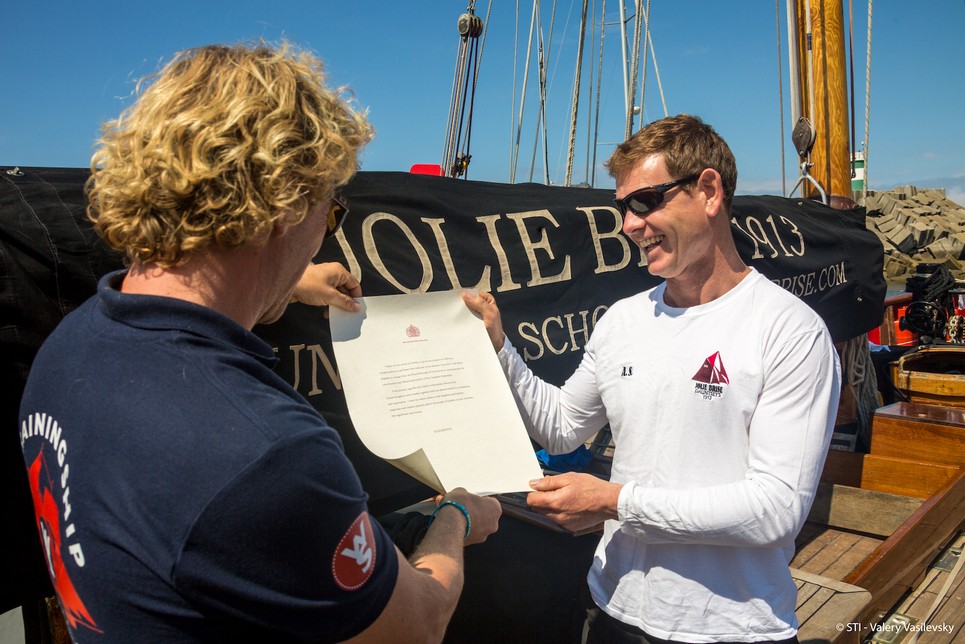 Wylde Swan handing over the Queen's letter to Jolie Brise